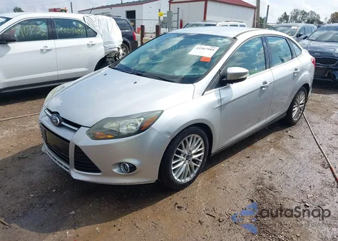 2014 Ford Focus Titanium from USA, damaged, VIN 1FADP3J28EL223087